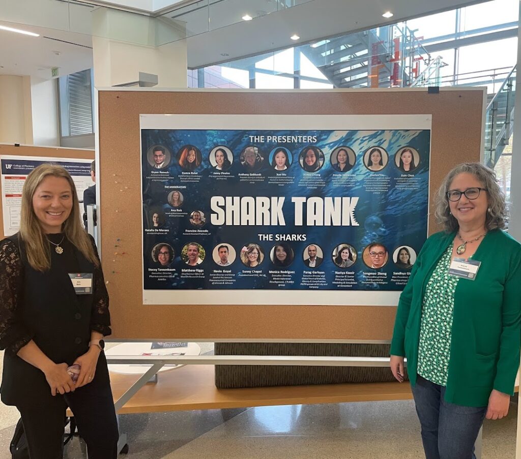 Ana Ruiz and me by the Shark Tank poster at University of Florida